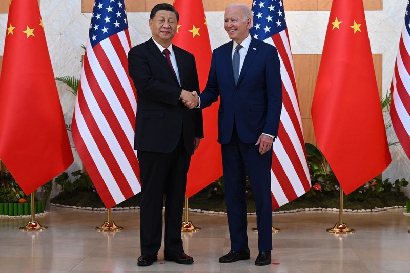 Xi Jinping - Joe Biden US President Joe Biden (L) and China's President Xi Jinping (R) meet on the sidelines of the G20 Summit in Nusa Dua on the Indonesian resort island of Bali on November 14, 2022. (Photo by SAUL LOEB / AFP) (Photo by SAUL LOEB/AFP via Getty Images)
