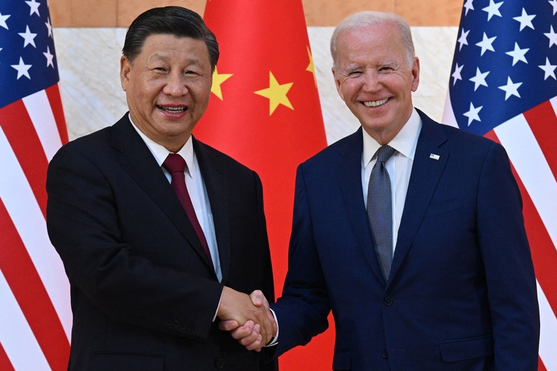 Xi Jinping - Joe Biden US President Joe Biden (L) and China's President Xi Jinping (R) meet on the sidelines of the G20 Summit in Nusa Dua on the Indonesian resort island of Bali on November 14, 2022. (Photo by SAUL LOEB / AFP) (Photo by SAUL LOEB/AFP via Getty Images)