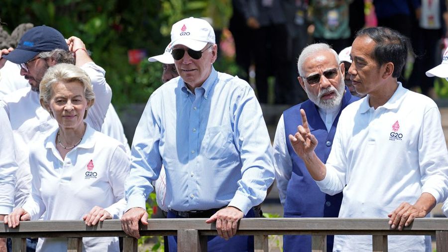 European Union President Ursula von Der Leyen, left, U.S. President Joe Biden, center, and Indian Prime Minister Narendra Modi, listen to Indonesian President Joko Widodo, right, before a tree planting event at the Taman Hutan Raya Ngurah Rai Mangrove Forest, on the sidelines of the G20 summit meeting, Wednesday, Nov. 16, 2022, in Denpasar, Bali, Indonesia. Alex Brandon/Pool via REUTERS