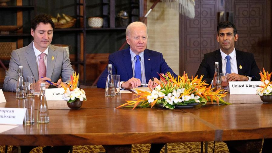 Canada's Prime Minister Justin Trudeau, U.S. President Joe Biden and British Prime Minister Rishi Sunak attend an emergency meeting of leaders at the G20 summit following the overnight missile strike by a Russian-made rocket on Poland, November 16, 2022 in Bali, Indonesia. Leon Neal/Pool via Reuters