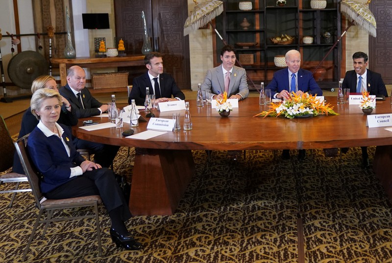 UKRAINE-CRISIS/POLAND-BLAST-BIDEN European Commission President Ursula von der Leyen, Italy's Prime Minister Giorgia Meloni, Germany's Chancellor Olaf Scholz, France's President Emmanuel Macron, Canada's Prime Minister Justin Trudeau, U.S. President Joe Biden, British Prime Minister Rishi Sunak, Spain's Prime Minister Pedro Sanchez, Netherland's Prime Minister Mark Rutte, Japanese Prime Minister Fumio Kishida, U.S. Secretary of State Anthony Blinken and European Council President Charles Michel attend an emergency meeting of global leaders after an alleged Russian missile blast in Poland, in Bali, Indonesia, November 16, 2022. REUTERS/Kevin Lamarque