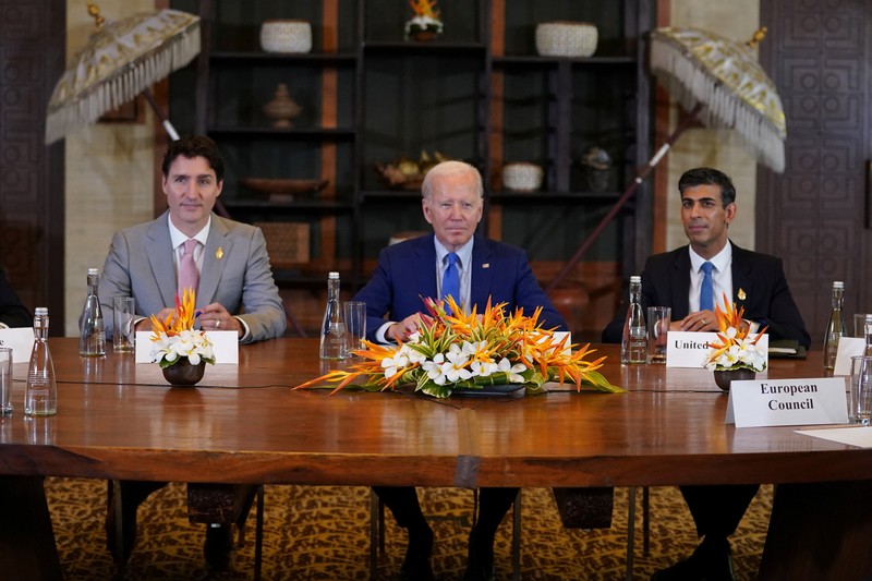 UKRAINE-CRISIS/POLAND-BLAST-BIDEN European Commission President Ursula von der Leyen, Italy's Prime Minister Giorgia Meloni, Germany's Chancellor Olaf Scholz, France's President Emmanuel Macron, Canada's Prime Minister Justin Trudeau, U.S. President Joe Biden, British Prime Minister Rishi Sunak, Spain's Prime Minister Pedro Sanchez, Netherland's Prime Minister Mark Rutte, Japanese Prime Minister Fumio Kishida, U.S. Secretary of State Anthony Blinken and European Council President Charles Michel attend an emergency meeting of global leaders after an alleged Russian missile blast in Poland, in Bali, Indonesia, November 16, 2022. REUTERS/Kevin Lamarque