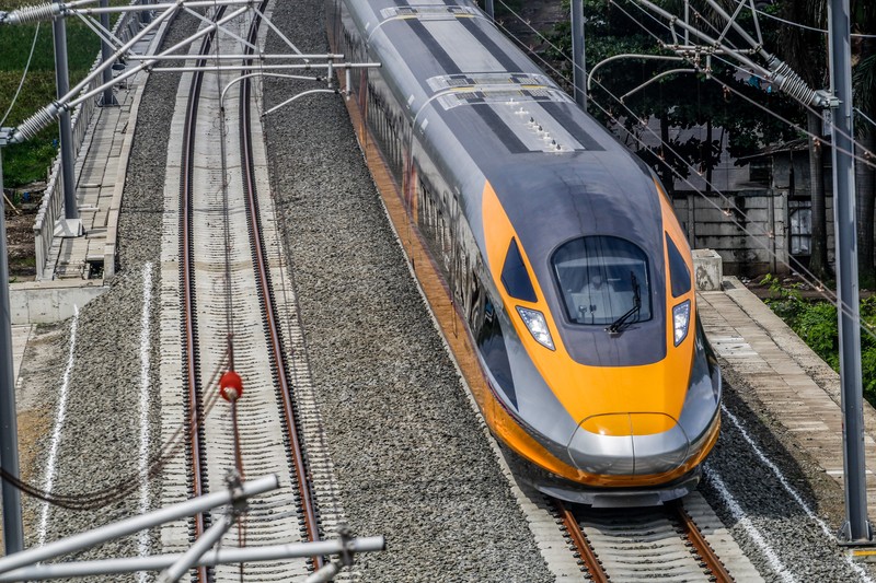 1244824722 BANDUNG, WEST JAVA, INDONESIA - 2022/11/16: Jakarta Bandung High-Speed Train (KCJB) or Comprehensive Inspection Train (CIT) was seen during the dynamic trial in Tegalluar. President Joko Widodo and Chinese President Xi Jinping are planning to see online the dynamic trial process of the 15 km Jakarta Bandung High-Speed Train with a limited speed of 80 km/hour during a sidelines visit from the G20 summit in Bali. (Photo by Algi Febri Sugita/SOPA Images/LightRocket via Getty Images)