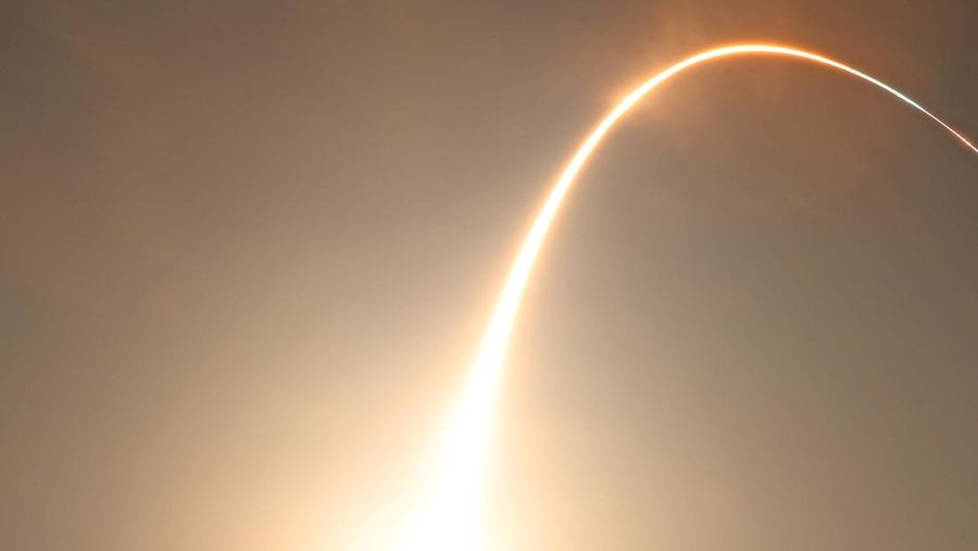 A time exposure shows the path of the Artemis I unmanned lunar rocket as it lifts off from launch pad 39B at NASA's Kennedy Space Center in Cape Canaveral, Florida, on November 16, 2022. - NASA's Artemis 1 mission is a 25-and-a-half day voyage beyond the far side of the Moon and back. The meticulously choreographed uncrewed flight should yield spectacular images as well as valuable scientific data. (Photo by Gregg Newton / AFP) (Photo by GREGG NEWTON/AFP via Getty Images)