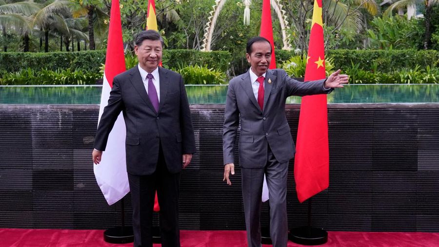 Indonesian President Joko Widodo, right, shows the way to Chinese President Xi Jinping during their bilateral meeting on the sidelines of the G20 summit in Nusa Dua, Bali, Indonesia, Wednesday, Nov. 16, 2022. Achmad Ibrahim/Pool via REUTERS