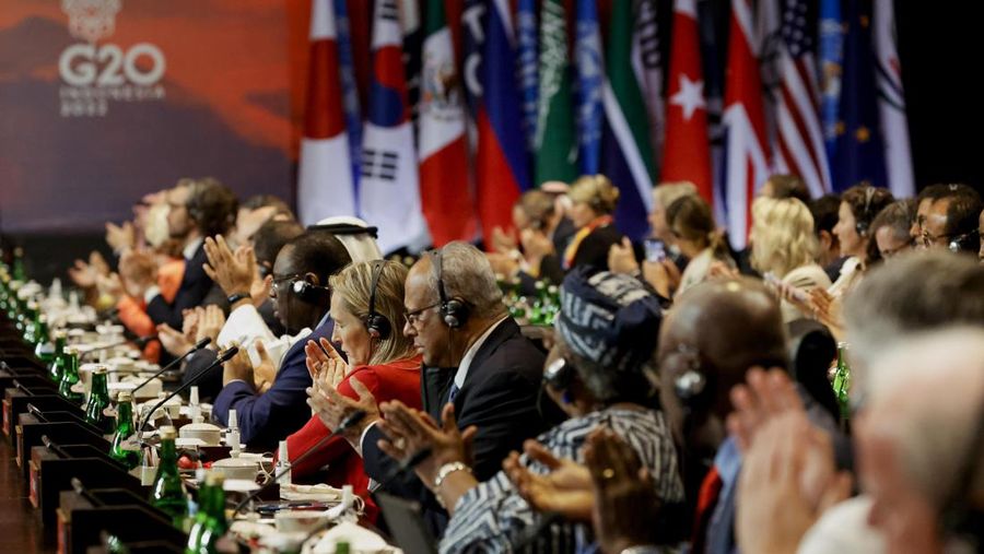 Delegates applaud during the handover ceremony at the G20 Leaders' Summit, in Nusa Dua, Bali, Indonesia, Wednesday Nov. 16, 2022. (Willy Kurniawan/Pool Photo via AP)