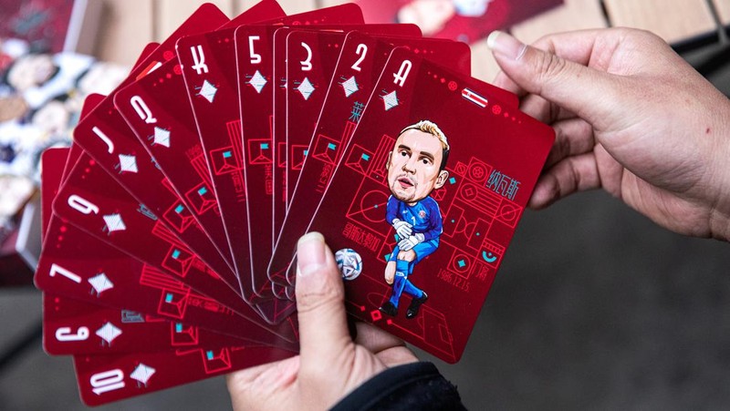 WUHAN, CHINA - NOVEMBER 16:（CHINA OUT）A set of playing cards is shown bearing caricatures of World Cup star players, created by the cartoonist Tao Gang, 40, for the 2022 Qatar World Cup on November 16, 2022 in Wuhan, Hubei province, China. Tao spent three months painting the portraits. The opening ceremony of the 22nd World Cup will be held in Doha, the capital of Qatar, on November 20.  (Photo by Getty Images)
