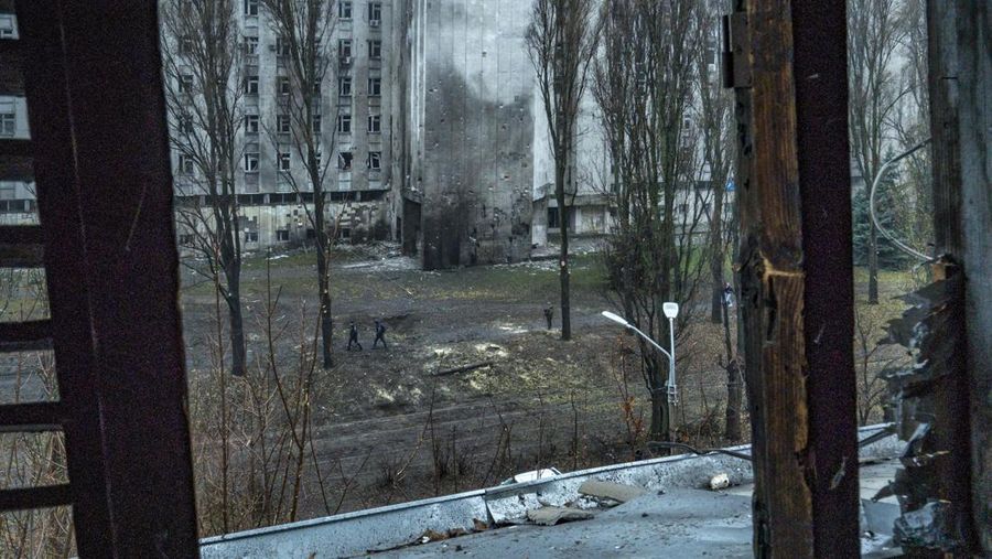 A man takes measures of his destroyed window by the shock wave of the explosion of a russian missile over Dnipro city, Ukraine. (Photo by Celestino Arce/NurPhoto via Getty Images)