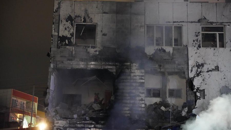 SULAYMANIYAH, IRAQ - NOVEMBER 17: Number of firefighters and paramedics are dispatched to the area, in Suleymaniyah, Iraq on November 17, 2022. A 3-storey building collapsed in the explosion that occurred due to a gas leak in a house in Kazive Neighborhood of Sulaymaniyah. (Photo by Feriq Faraj/Anadolu Agency via Getty Images)