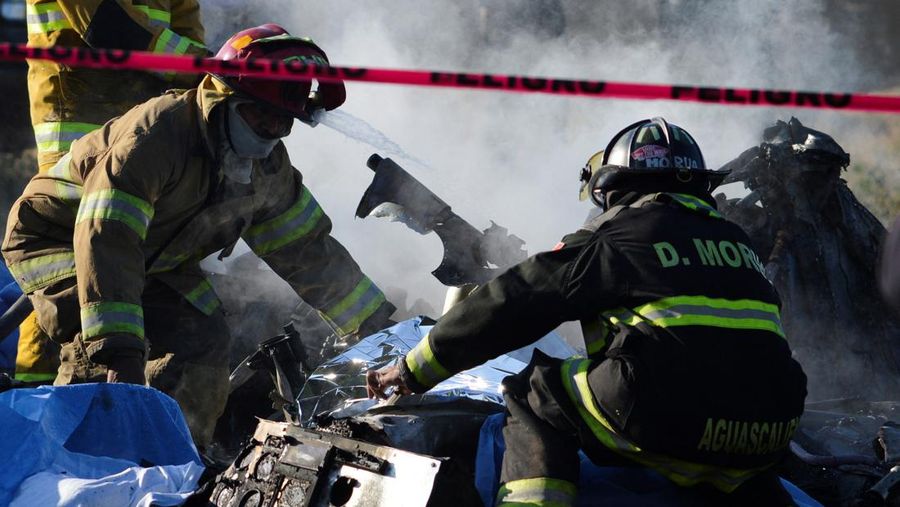 Members of security forces check the site where the head of security of the central Mexican state of Aguascalientes has died in a helicopter crash, in Aguascalientes, Mexico November 17, 2022. REUTERS/Liberto Urena NO RESALES. NO ARCHIVES