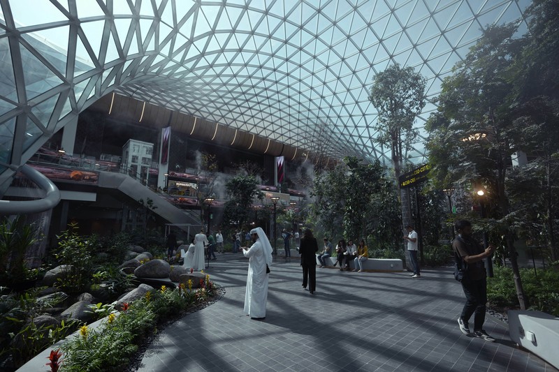 Passengers walk at Hamad International Airport in Doha, Qatar, Thursday, Nov. 10, 2022.   (AP Photo/Hassan Ammar)