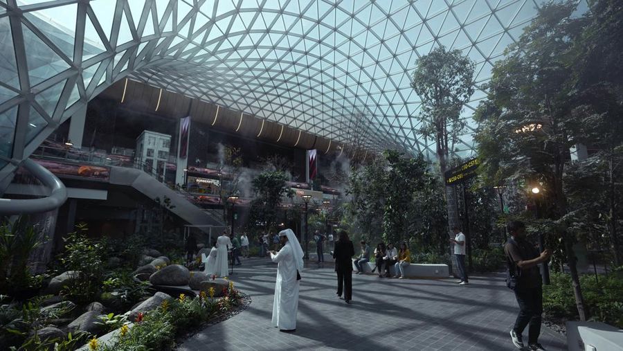 Passengers walk at Hamad International Airport in Doha, Qatar, Thursday, Nov. 10, 2022.   (AP Photo/Hassan Ammar)