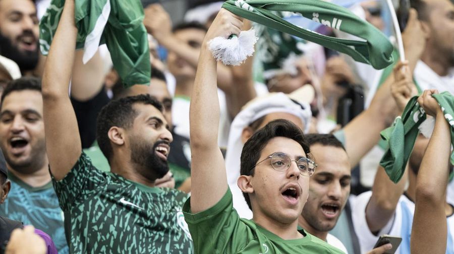 LUSAIL CITY, QATAR - NOVEMBER 22: Saudi Arabia fans celebrate during the FIFA World Cup Qatar 2022 Group C match between Argentina and Saudi Arabia at Lusail Stadium on November 22, 2022 in Lusail City, Qatar. (Photo by Sebastian Frej/MB Media/Getty Images)
