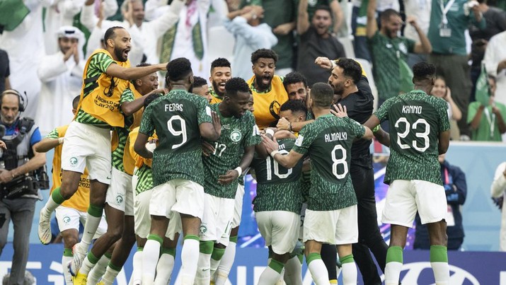 LUSAIL CITY, QATAR - NOVEMBER 22: Saudi Arabia players celebrate their second goal to make the score 1-2 during the FIFA World Cup Qatar 2022 Group C match between Argentina and Saudi Arabia at Lusail Stadium on November 22, 2022 in Lusail City, Qatar. (Photo by Sebastian Frej/MB Media/Getty Images)