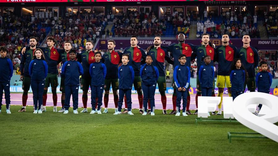 DOHA, QATAR - NOVEMBER 24: Cristiano Ronaldo of Portugal is seen in the tunnel with player mascots prior to the FIFA World Cup Qatar 2022 Group H match between Portugal and Ghana at Stadium 974 on November 24, 2022 in Doha, Qatar. (Photo by Sarah Stier - FIFA/FIFA via Getty Images)