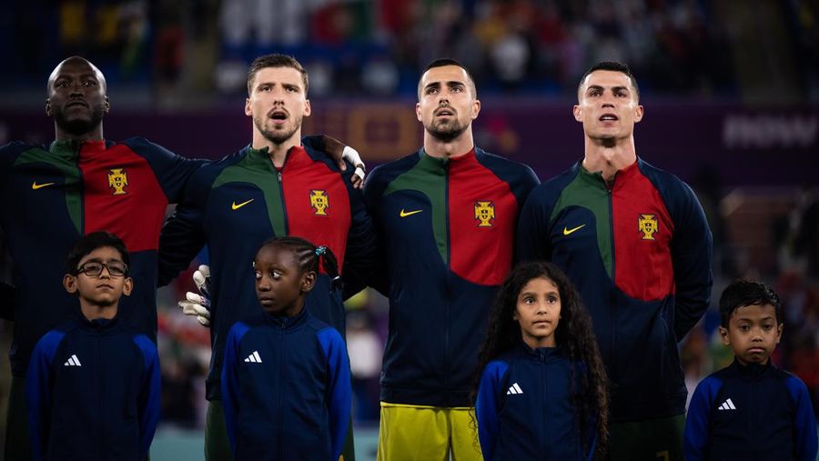 DOHA, QATAR - NOVEMBER 24: Cristiano Ronaldo of Portugal is seen in the tunnel with player mascots prior to the FIFA World Cup Qatar 2022 Group H match between Portugal and Ghana at Stadium 974 on November 24, 2022 in Doha, Qatar. (Photo by Sarah Stier - FIFA/FIFA via Getty Images)