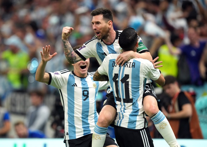 Penyerang Argentina #10 Lionel Messi tersenyum setelah memenangkan pertandingan sepak bola Grup C Piala Dunia Qatar 2022 antara Argentina dan Meksiko di Stadion Lusail di Lusail, utara Doha pada 26 November 2022. Argentina's forward #10 Lionel Messi reacts at the final whistle of the Qatar 2022 World Cup Group C football match between Argentina and Mexico at the Lusail Stadium in Lusail, north of Doha on November 26, 2022. (Photo by Kirill KUDRYAVTSEV / AFP) (Photo by KIRILL KUDRYAVTSEV/AFP via Getty Images)