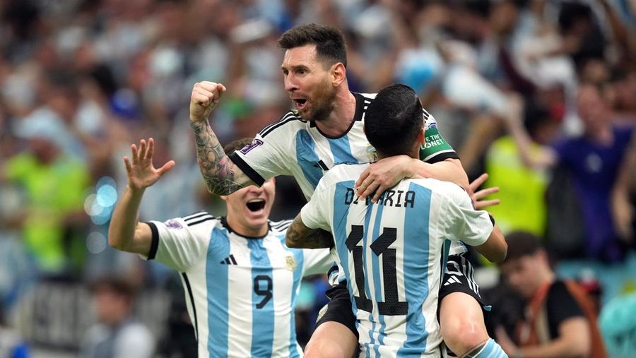 Argentina's Lionel Messi celebrates scoring their side's first goal of the game during the FIFA World Cup Group C match at the Lusail Stadium in Lusail, Qatar. Picture date: Saturday November 26, 2022. (Photo by Martin Rickett/PA Images via Getty Images)