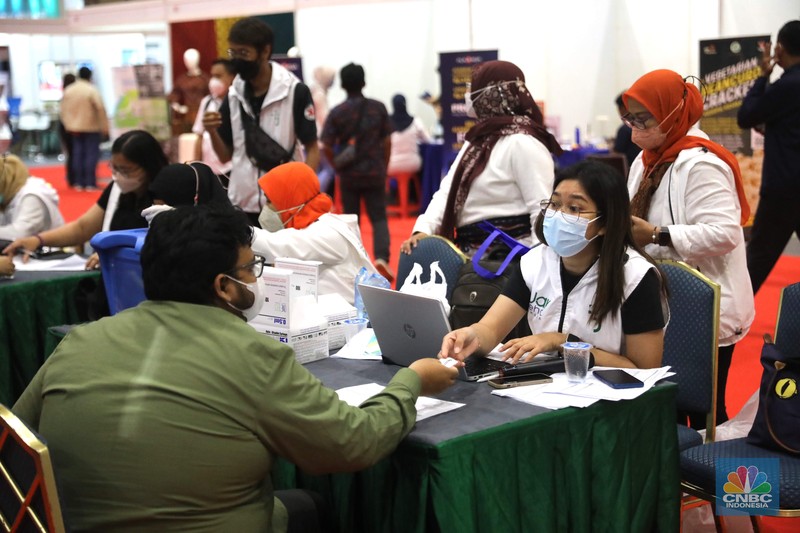 Layanan vaksin booster gratis di Hall B, Jakarta Convention Center (JCC), Senayan, Jakarta Pusat, Selasa, 29/11. Layanan vaksin booster gratis di Hall B, Jakarta Convention Center (JCC), Senayan, Jakarta Pusat, Selasa, 29/11. (CNBC Indonesia/ Muhammad Sabki)