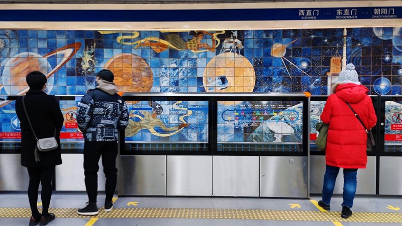 BEIJING, CHIAN - DECEMBER 5, 2022 - A light passenger flow is seen during the morning rush hour on Metro Line 5 in Beijing, China, December 5, 2022. On the same day, Beijing cancelled nucleic acid inspection on buses and subways. (Photo credit should read CFOTO/Future Publishing via Getty Images)