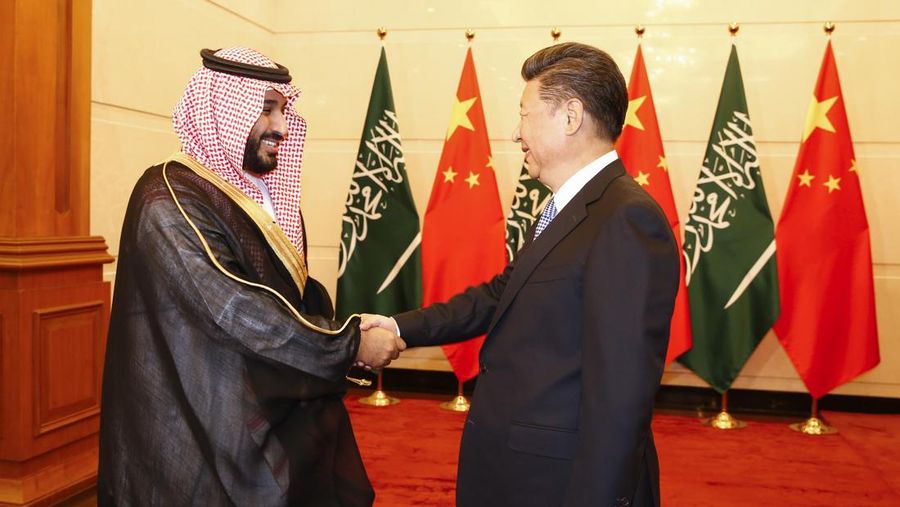 BEIJING, CHINA - AUGUST 31:  Saudi Arabia Deputy Crown Prince Mohammed bin Salman (L) greets Chinese President Xi Jinping (R) during a meeting at the Diaoyutai State guest house on August 31, 2016 in Beijing, China. The deputy prince is meeting Chinese officials during his visit to boost bilateral ties between the two nations.  (Photo by Rolex - Pool/Getty Images)
