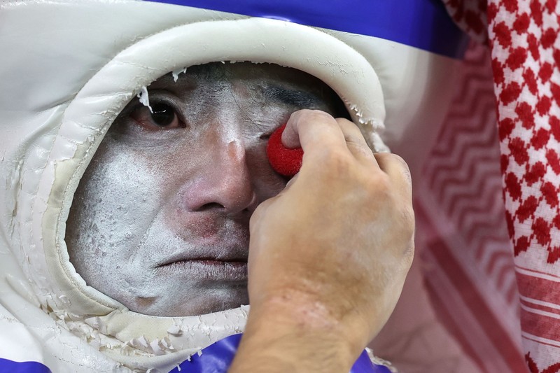 1245392905 AL WAKRAH, QATAR - DECEMBER 05: A Japanese fan uses his sponge nose to dab tears from his eyes during the FIFA World Cup Qatar 2022 Round of 16 match between Japan and Croatia at Al Janoub Stadium on December 5, 2022 in Al Wakrah, Qatar. (Photo by Charlotte Wilson/Offside/Offside via Getty Images)