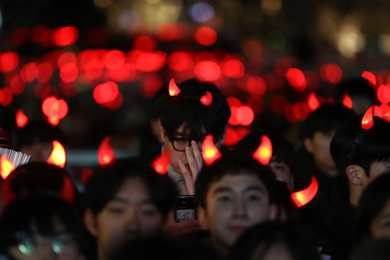 1245392905 AL WAKRAH, QATAR - DECEMBER 05: A Japanese fan uses his sponge nose to dab tears from his eyes during the FIFA World Cup Qatar 2022 Round of 16 match between Japan and Croatia at Al Janoub Stadium on December 5, 2022 in Al Wakrah, Qatar. (Photo by Charlotte Wilson/Offside/Offside via Getty Images)