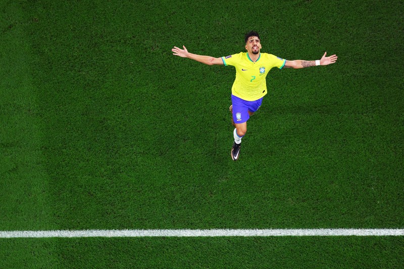 SOCCER-WORLDCUP-BRA-KOR/REPORT Soccer Football - FIFA World Cup Qatar 2022 - Round of 16 - Brazil v South Korea - Stadium 974, Doha, Qatar - December 5, 2022 Brazil's Vinicius Junior scores their first goal REUTERS/Kim Hong-Ji