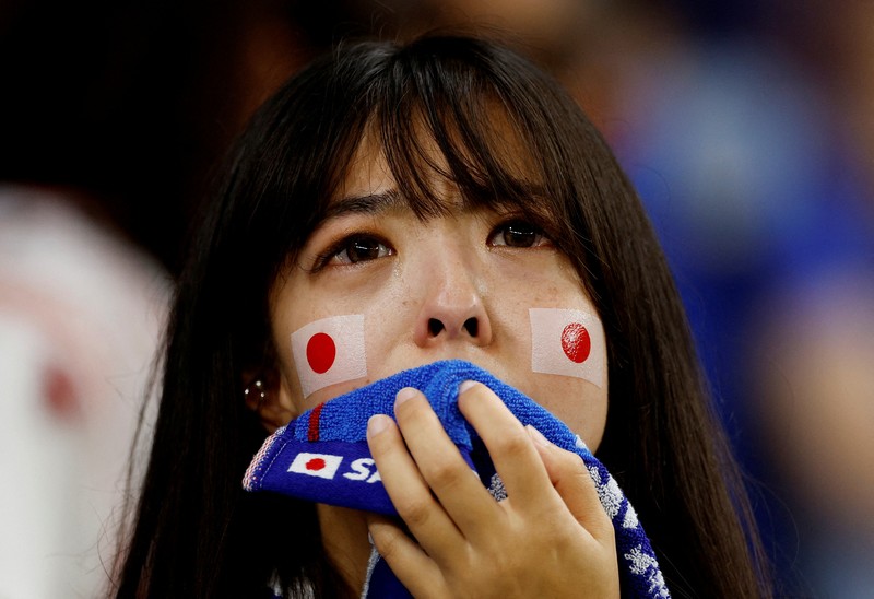 1245392905 AL WAKRAH, QATAR - DECEMBER 05: A Japanese fan uses his sponge nose to dab tears from his eyes during the FIFA World Cup Qatar 2022 Round of 16 match between Japan and Croatia at Al Janoub Stadium on December 5, 2022 in Al Wakrah, Qatar. (Photo by Charlotte Wilson/Offside/Offside via Getty Images)