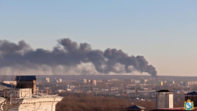In this handout photo released by the administration of the Kursk region of Russia on Tuesday, Dec. 6, 2022, smoke rises from the area of Kursk airport outside Kursk, Russia. A fire that broke out at an airport in Russia’s southern Kursk region that borders Ukraine was the result of a drone attack, the Kursk regional governor said Tuesday, a day after Moscow blamed Kyiv for drone strikes on two air bases deep inside Russia and launched a new wave of missile strikes on Ukrainian territory.  (Administration of the Kursk region of Russia via AP)