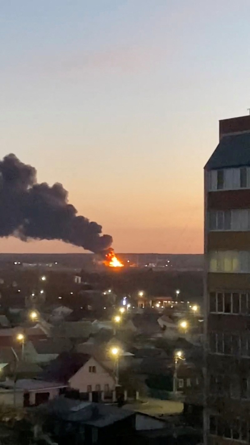 Russia Ukraine In this handout photo released by the administration of the Kursk region of Russia on Tuesday, Dec. 6, 2022, smoke rises from the area of Kursk airport outside Kursk, Russia. A fire that broke out at an airport in Russia’s southern Kursk region that borders Ukraine was the result of a drone attack, the Kursk regional governor said Tuesday, a day after Moscow blamed Kyiv for drone strikes on two air bases deep inside Russia and launched a new wave of missile strikes on Ukrainian territory. (Administration of the Kursk region of Russia via AP)