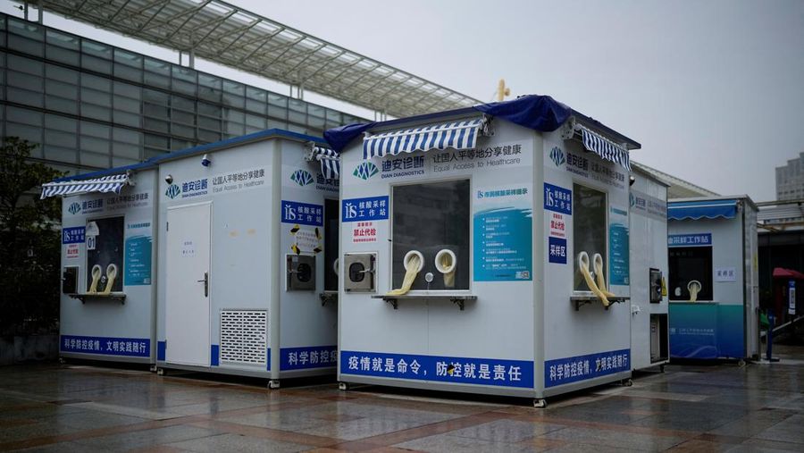 Closed mobile nucleic acid testing booths are pictured outside the Shanghai Railway Station as coronavirus disease (COVID-19) outbreaks continue in Shanghai, China, December 8, 2022. REUTERS/Aly Song