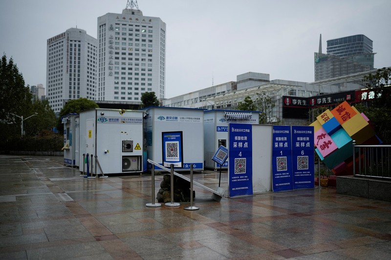 Closed mobile nucleic acid testing booths are pictured outside the Shanghai Railway Station as coronavirus disease (COVID-19) outbreaks continue in Shanghai, China, December 8, 2022. REUTERS/Aly Song