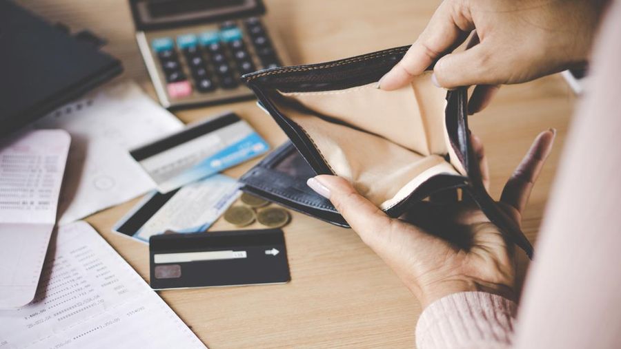 poor Asian woman hand open empty purse looking for money having problem  bankrupt broke after credit card payday