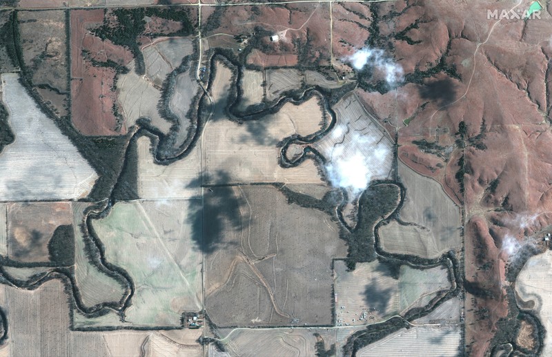 A satellite image shows emergency crews and equipment working to clean up the crude oil spill along Mill Creek following the leak at the Keystone pipeline operated by TC Energy, in Washington County, Kansas, U.S. December 10, 2022.  Satellite image 2022 Maxar Technologies/Handout via REUTERS THIS IMAGE HAS BEEN SUPPLIED BY A THIRD PARTY. NO RESALES. NO ARCHIVES. MANDATORY CREDIT. DO NOT OBSCURE LOGO