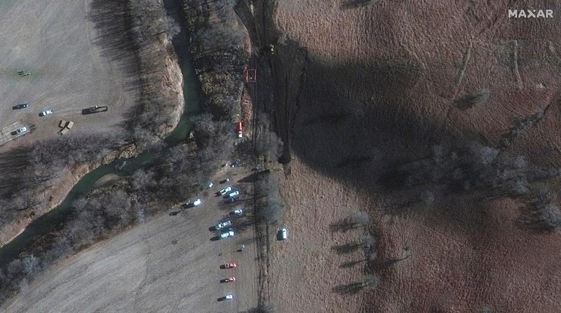 A satellite image shows emergency crews and equipment working to clean up the crude oil spill along Mill Creek following the leak at the Keystone pipeline operated by TC Energy, in Washington County, Kansas, U.S. December 10, 2022.  Satellite image 2022 Maxar Technologies/Handout via REUTERS THIS IMAGE HAS BEEN SUPPLIED BY A THIRD PARTY. NO RESALES. NO ARCHIVES. MANDATORY CREDIT. DO NOT OBSCURE LOGO