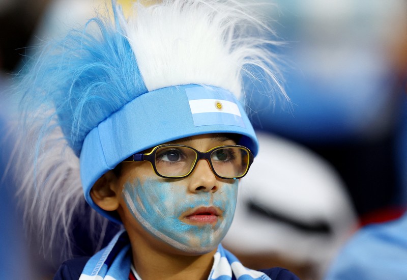 Soccer Football - FIFA World Cup Qatar 2022 - Group D - Tunisia v France - Education City Stadium, Al Rayyan, Qatar - November 30, 2022 A young fan inside the stadium before the match REUTERS/Carl Recine     TPX IMAGES OF THE DAY