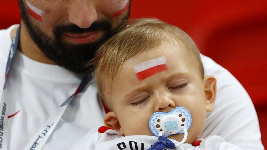 Soccer Football - FIFA World Cup Qatar 2022 - Group D - Tunisia v France - Education City Stadium, Al Rayyan, Qatar - November 30, 2022 A young fan inside the stadium before the match REUTERS/Carl Recine     TPX IMAGES OF THE DAY