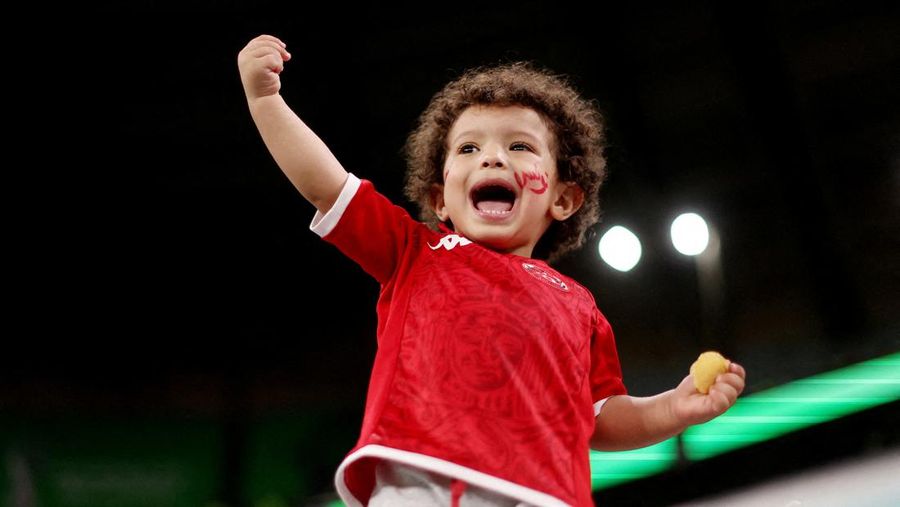 Soccer Football - FIFA World Cup Qatar 2022 - Group D - Tunisia v France - Education City Stadium, Al Rayyan, Qatar - November 30, 2022 A young fan inside the stadium before the match REUTERS/Carl Recine     TPX IMAGES OF THE DAY