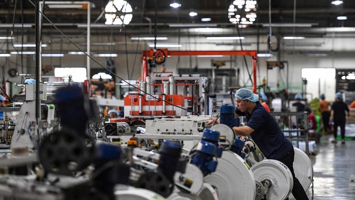 Badai phk di perusahaan Vietnam. (AFP via Getty Images/NHAC NGUYEN)