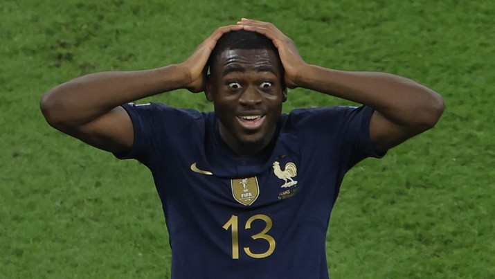 Gelandang Prancis #13 Youssouf Fofana merayakan kemenangan setelah timnya memenangkan pertandingan sepak bola semifinal Piala Dunia Qatar 2022 antara Prancis dan Maroko Gelandang Prancis #13 Youssouf Fofana merayakan kemenangan setelah timnya memenangkan pertandingan sepak bola semifinal Piala Dunia Qatar 2022 antara Prancis dan Maroko di Stadion Al-Bayt di Al Khor, utara Doha, Qatar, Rabu (14/12/2022). (Photo by ODD ANDERSEN/AFP via Getty Images)