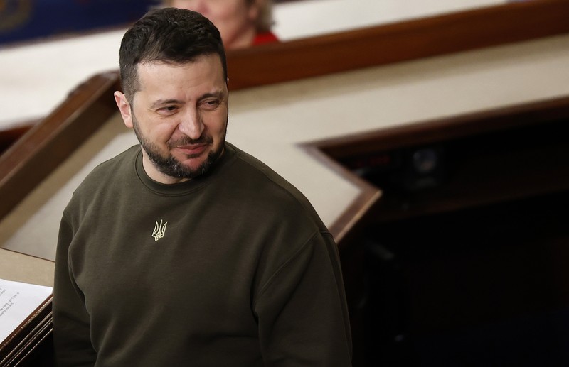 WASHINGTON, DC - DECEMBER 21: President of Ukraine Volodymyr Zelensky greets Rep. Rosa Delauro (D-CT) and other lawmakers as he arrives to address a joint meeting of Congress in the House Chamber of the U.S. Capitol on December 21, 2022 in Washington, DC. In his first known trip outside of Ukraine since Russia invaded, Zelensky met with U.S. President Joe Biden and outlined Ukraine's request for continued military aid. Seated behind Zelensky was U.S. Vice President Kamala Harris (L) and Speaker of the House Nancy Pelosi (D-CA).  (Photo by Anna Moneymaker/Getty Images)