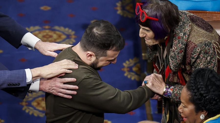 WASHINGTON, DC - DECEMBER 21: President of Ukraine Volodymyr Zelensky greets Rep. Rosa Delauro (D-CT) and other lawmakers as he arrives to address a joint meeting of Congress in the House Chamber of the U.S. Capitol on December 21, 2022 in Washington, DC. In his first known trip outside of Ukraine since Russia invaded, Zelensky met with U.S. President Joe Biden and outlined Ukraine's request for continued military aid. Seated behind Zelensky was U.S. Vice President Kamala Harris (L) and Speaker of the House Nancy Pelosi (D-CA).  (Photo by Anna Moneymaker/Getty Images)