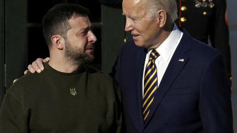US President Joe Biden welcomes Ukraine's President Volodymyr Zelensky on the South Lawn of the White House, in Washington, DC on December 21, 2022. - Zelensky is in Washington to meet with US President Joe Biden and address Congress -- his first trip abroad since Russia invaded in February. (Photo by OLIVIER DOULIERY / AFP)