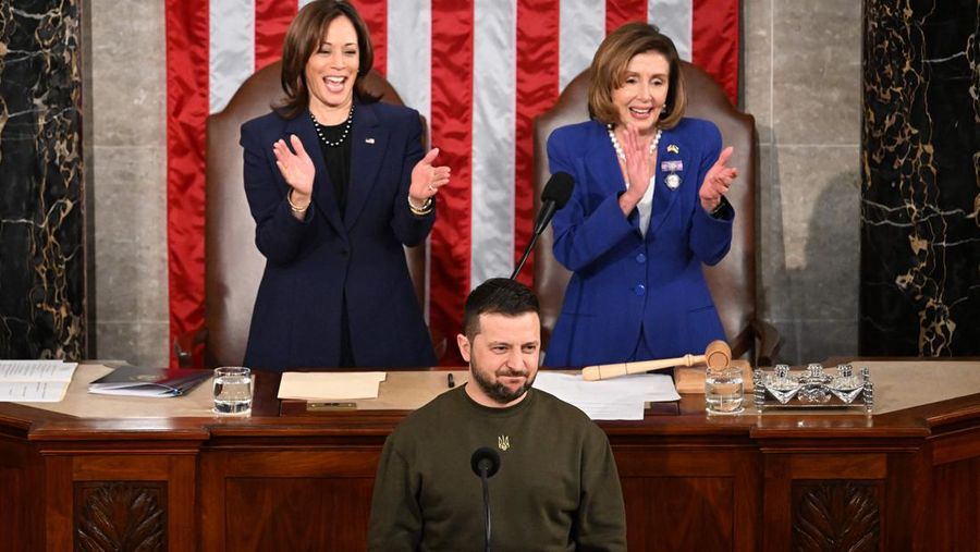 President of Ukraine Volodymyr Zelensky addresses a joint meeting of Congress in the House Chamber of the U.S. Capitol on December 21, 2022 in Washington, DC. In his first known trip outside of Ukraine since Russia invaded, Zelensky met with U.S. President Joe Biden and outlined Ukraine's request for continued military aid. Seated behind Zelensky was U.S. Vice President Kamala Harris (L) and Speaker of the House Nancy Pelosi (D-CA).  (Photo by Chip Somodevilla/Getty Images)