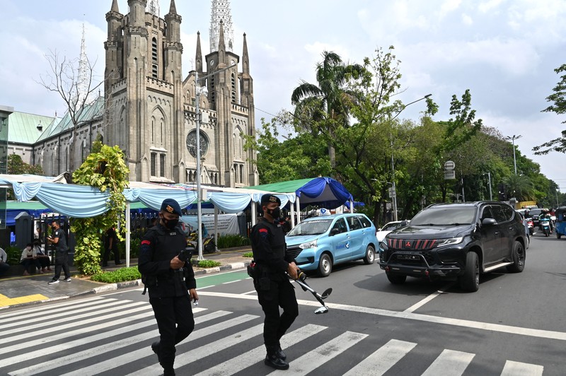 Anti-terror police check security at a church ahead of Christmas eve in Medan on December 24, 2022. (Photo by ARIANDI / AFP) (Photo by ARIANDI/AFP via Getty Images)