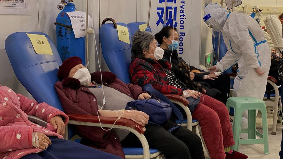 Provinsi Zhejiang China, sedang berjuang melawan sekitar satu juta kasus COVID-19 baru setiap hari. (AFP via Getty Images/NOEL CELIS)