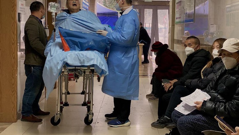 Provinsi Zhejiang China, sedang berjuang melawan sekitar satu juta kasus COVID-19 baru setiap hari. (AFP via Getty Images/NOEL CELIS)