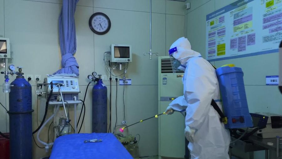Provinsi Zhejiang China, sedang berjuang melawan sekitar satu juta kasus COVID-19 baru setiap hari. (AFP via Getty Images/NOEL CELIS)