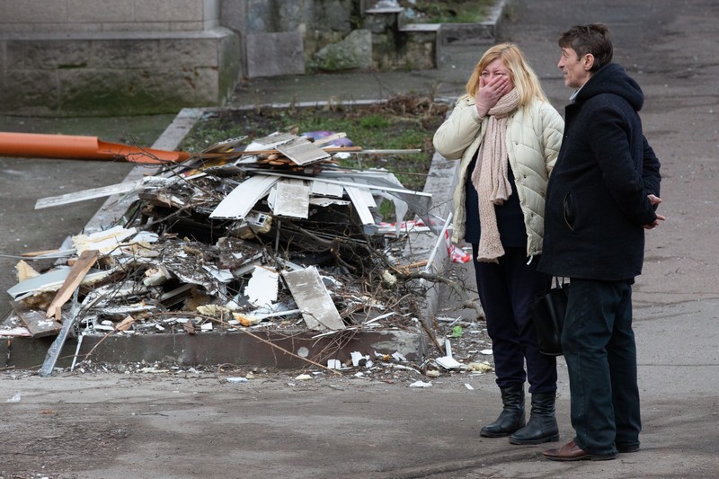 1245929257 KYIV, UKRAINE - 2023/01/01: View of a destroyed residential building after a missile attack by Russia in Kyiv. Rocket attacks by Russia on December 31, 2022 in Kyiv, Ukraine. In many districts of Kyiv, a number of buildings were seriously damaged, 2 people died, and about 50 were injured. (Photo by Aleksandr Gusev/SOPA Images/LightRocket via Getty Images)